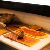 Pizza al tomate
